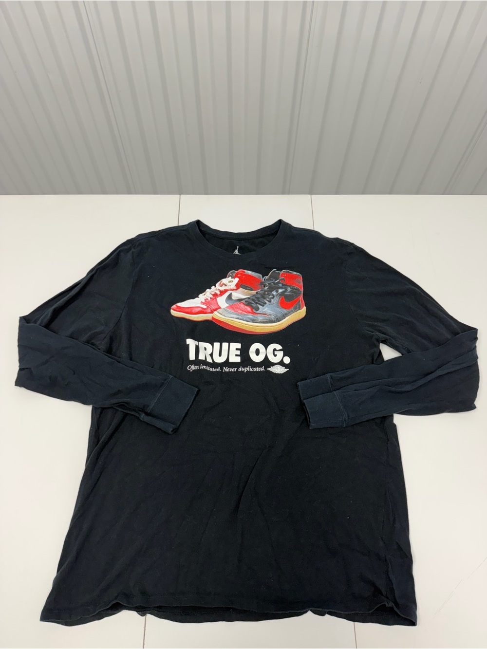 Air Jordan Black Long-Sleeve Tee with Red and White Sneaker Graphic